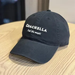 Black baseball cap with embroidered Coachella letters, stylish casual fashion hat.
