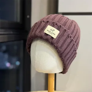 Purple knitted beanie hat with cute sheep patch, warm winter wool cap for men and women.