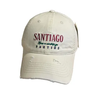 Vintage distressed beige baseball cap with embroidery, stylish washed cotton dad hat for women.