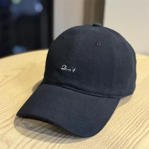 Classic black baseball cap with stylish embroidered text, casual cotton dad hat for daily wear.