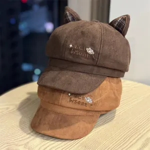 Detailed view of cute cat ear embroidery newsboy cap, soft suede fabric, stylish women hat.