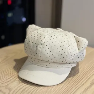 Cute polka dot beret hat detail, sweet style with cat ears design, stylish and cozy autumn wear.