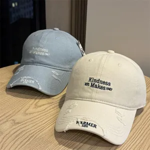 Distressed baseball cap with embroidery, casual sun hat for men and women, stylish adjustable.