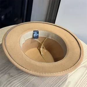 Detailed view of the vintage wool fedora hat interior lining and washing label structure.