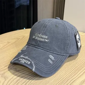 Distressed washed baseball cap with embroidery, casual unisex sun hat for summer outdoor wear.