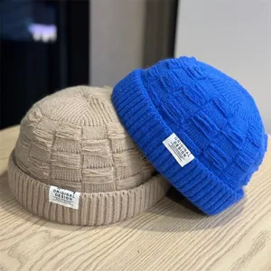 Japanse gebreide docker muts voor herfst en winter, comfortabel in blauw en kaki.