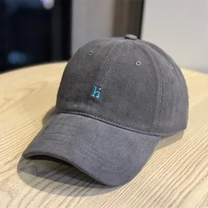 Vintage washed cotton baseball cap with blue letter, breathable soft top hat, casual.