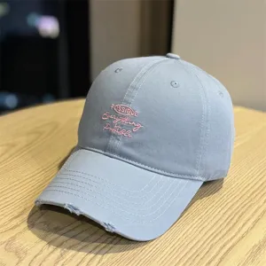 Light blue distressed baseball cap with front embroidery, casual streetwear style for daily wear.