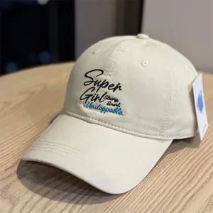 Beige cotton baseball cap with embroidered letter design, soft top casual hat for spring summer.
