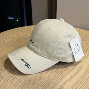 Japanese style embroidered baseball cap with curved brim, casual streetwear sunshade hat.