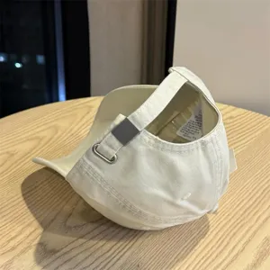 Casual baseball cap with adjustable metal buckle, curved brim design for daily street wear.