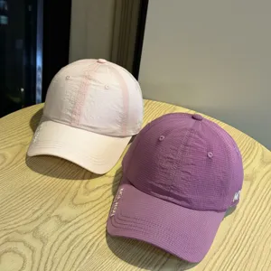 Quick-dry baseball cap with embroidered letters, breathable summer sun hat for men and women.