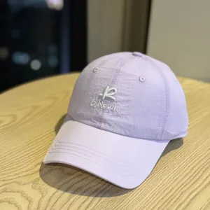 Unisex quick-dry baseball cap in light purple, featuring front embroidery and sun protection.