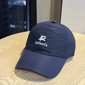 Quick-drying baseball cap with embroidered logo, casual streetwear sun hat for men and women.