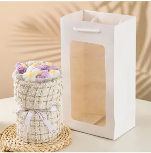 Ramo de flores de lana tejida a mano con bolsa de regalo, estilo tweed elegante.