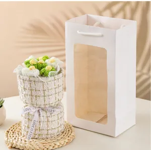 Ramo de flores de lana tejida a mano con maceta estilo tweed y bolsa de regalo para cumpleaños.