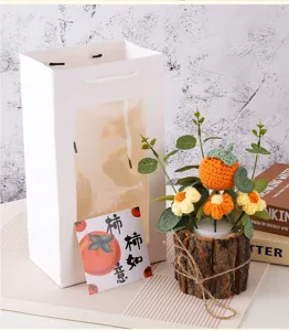 Handgemaakte gehaakte bloemen potplant met geschenkzak, perfect creatief cadeau voor meisjes.