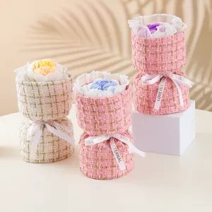 Handmade knitted rose flower bouquet in elegant tweed wrap with ribbon for romantic gift