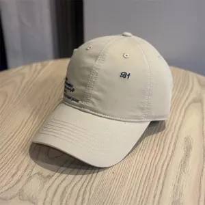 Vintage beige baseball cap with embroidery, casual streetwear cotton dad hat for daily wear.