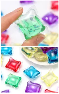 Capsules delessive concentrees multicolores pour un nettoyage en profondeur et de fraicheur.