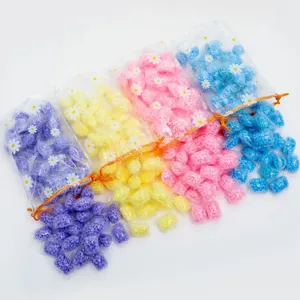 Perles parfumées colorées pour linge dans des sacs transparents aux marguerites, longue durée