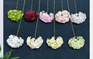 Artificial hydrangea flower detail showing multiple colorful lollipop stems for wedding decor design.