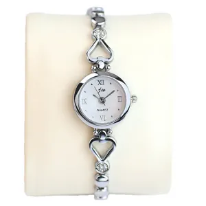 Stylish women quartz watch with silver heart strap and elegant white dial for daily wear.