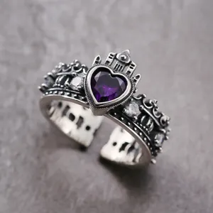 Detailed view of Korean style vintage silver crown heart purple cubic zirconia adjustable ring.