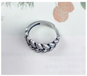 Vintage silver wheat ear ring detail, adjustable open band design, unique retro fashion accessory.