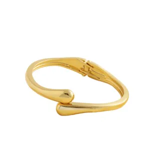 Minimalist gold plated open hinged bangle bracelet with modern geometric teardrop design for women