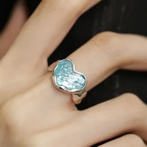 Sweet colorful epoxy resin heart ring with unique texture wrinkle design main view.
