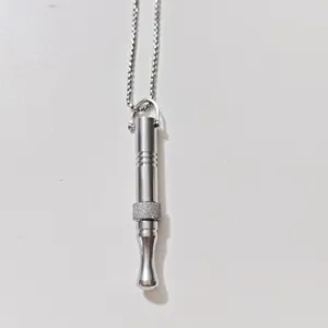 Stainless steel mindfulness breathing necklace detail close-up, anxiety relief jewelry.