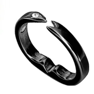 Magnetic therapy black ring detail showing the open adjustable design and embedded stone.
