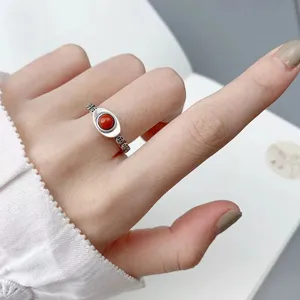 Vintage Thai silver red stone ring with lucky coin pattern, elegant open ring for daily wear.