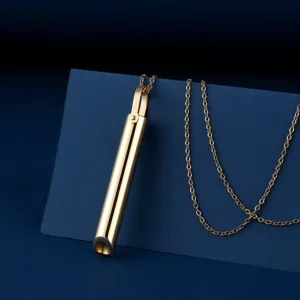 Close-up view of the gold stainless steel anxiety breathing necklace pendant detail.