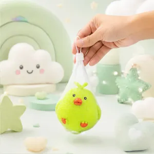 Cute green chick shaped mesh bath sponge and slow rebound stress relief toy product detail view