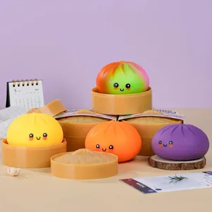 Joli jouet anti-stress dumpling squishy avec panier vapeur, jouet sensoriel pour enfants.