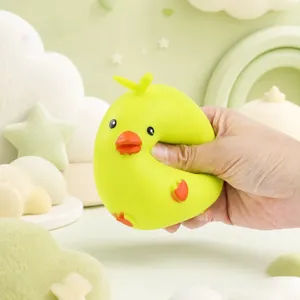 Detailed close-up showing the soft and slow-rebound texture of the cute yellow chick squishy.