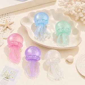 Cute jellyfish squeeze toy set, soft silicone stress relief sensory toys in multiple pastel colors.