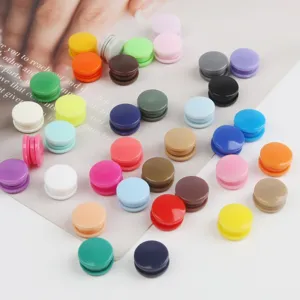 Colorful resin snap buttons for DIY crafts, sewing accessories and handmade clothing decor.