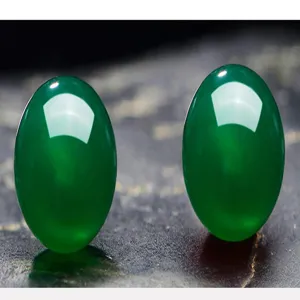 Natural green chalcedony cabochon gemstone jewelry, elegant oval cut pieces for design.