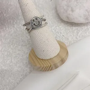 Vintage silver multi-layer open ring featuring engraved smiley face and love me detail.