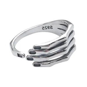 Vintage silver open ring featuring a creative skeletal hand design, stylish and artistic gothic.