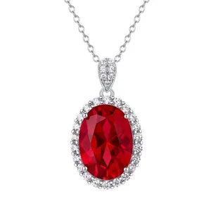 Elegant silver oval cultured ruby pendant necklace with sparkling zirconia halo for women.