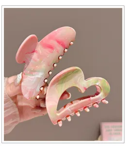 Pink marbled hair claw clip, hollow heart and crescent updo shark clip for sweet women.