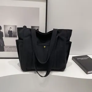 Borsa tote in tela nera grande capacità borsa a tracolla casual minimalista.