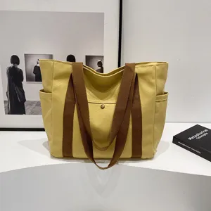Grande borsa shopper in tela gialla, borsa a spalla minimalista per lavoro e scuola.
