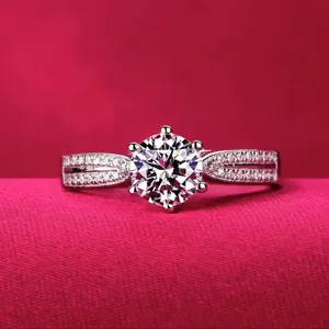 Close-up detail of a sparkling moissanite ring with split pave band and secure six-prong setting.