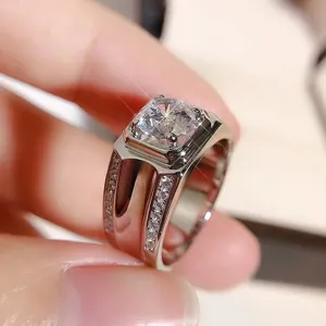 Detailed close-up of men's platinum plated square zirconia ring sparkling beautifully.
