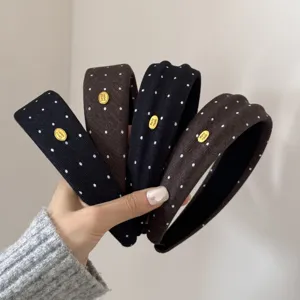 Cerchietti per capelli vintage in tessuto a pois per donna, eleganti con decoro in metallo.
